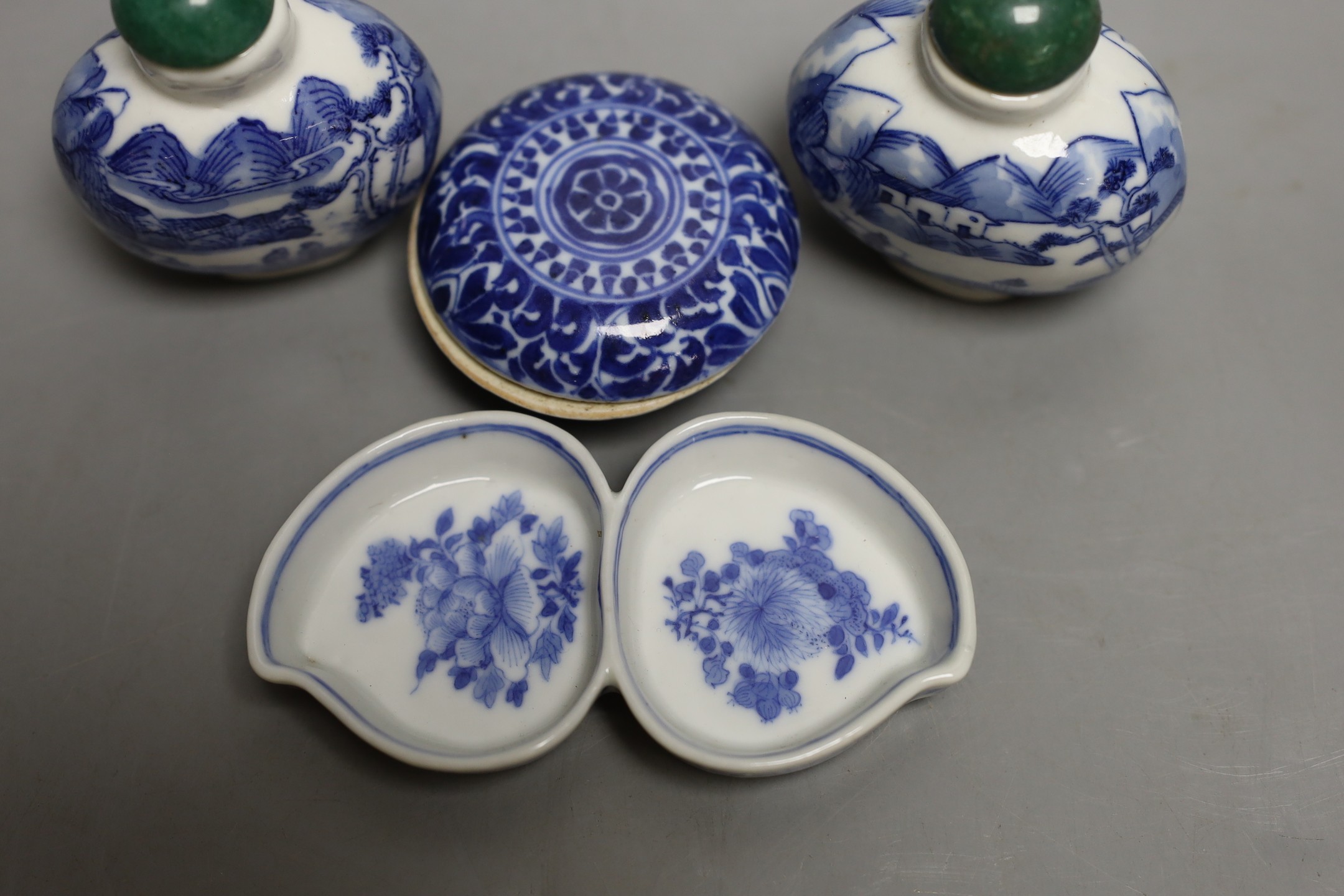 A Chinese blue and white seal paste box, brushwasher and a pair of snuff bottles, late 19th/early 20th century